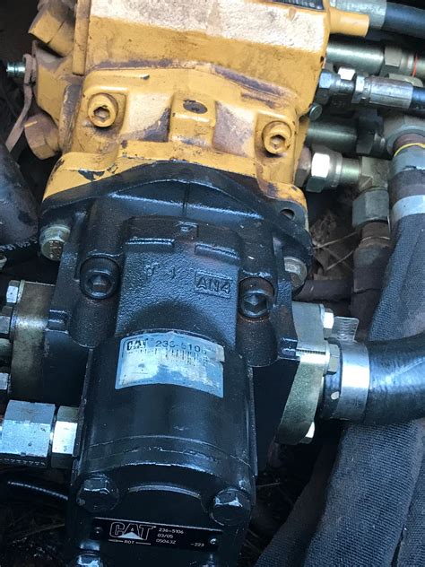 cat 247b hydraulic pump problems